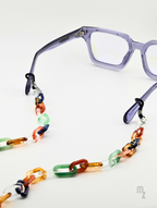 Lumière Chain - Farbige Acetat-Brillenkette an Blaulichtfilter-Brille, modernes Accessoire.
