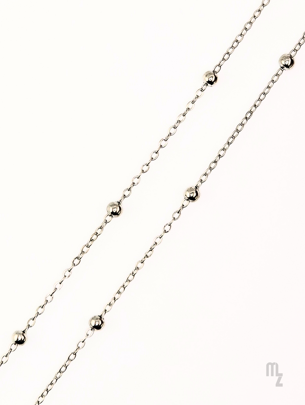 Sphere Chain – Minimalistische Brillenkette aus Edelstahlkugeln.